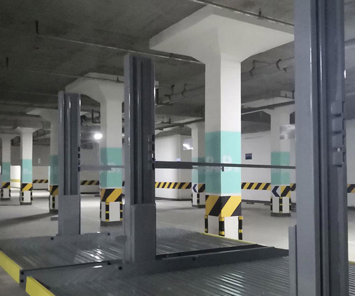 習水智能立體停車(chē)庫牽引機構及安全裝置的方案